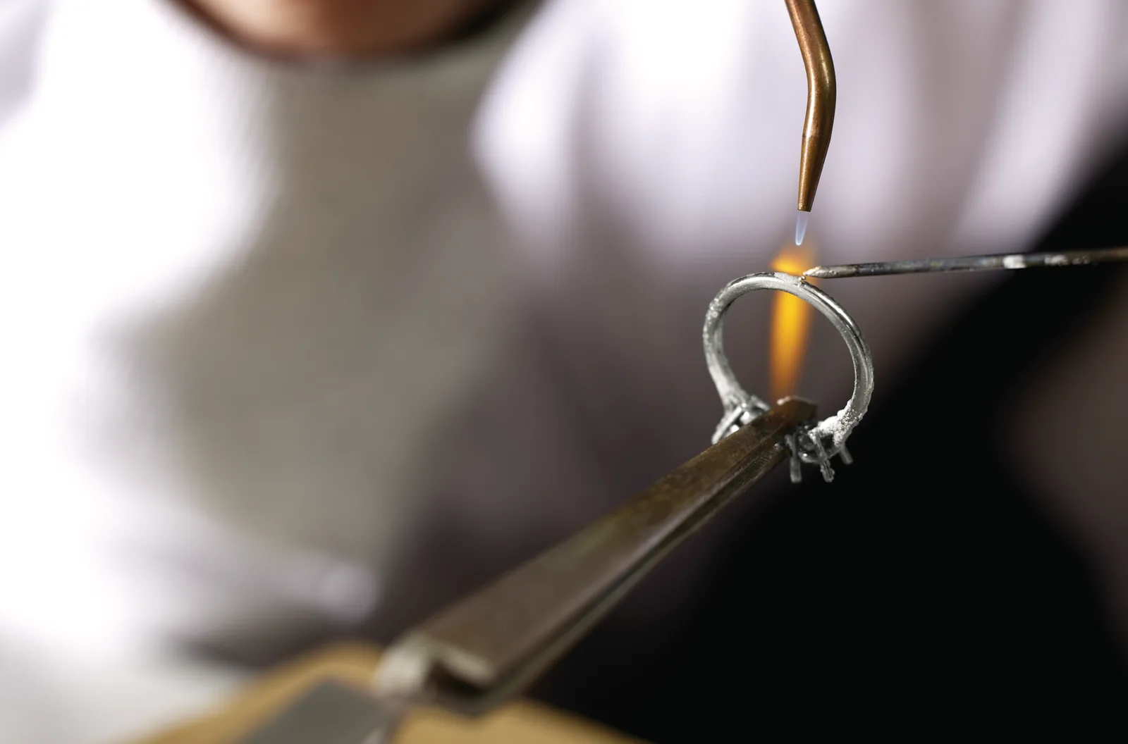 Fine jewelry work being carried out at a bench